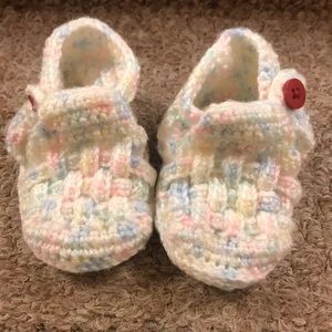 Hand knitted baby shoes for interior wear